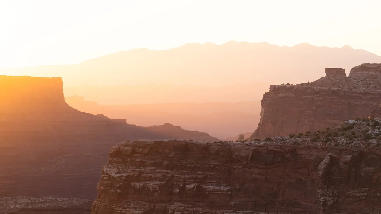 The La Sals stacked behind the rim